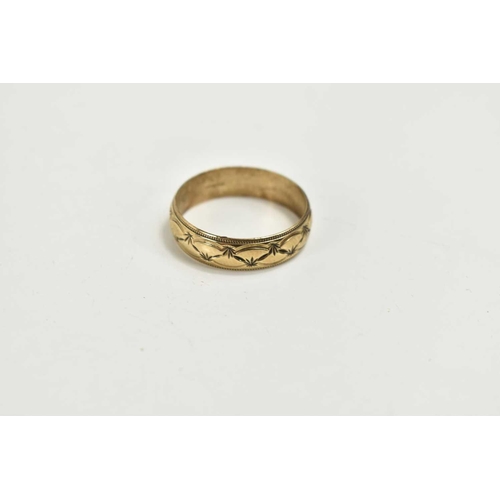 73 - A 9ct gold ring decorated with foliage, 5.1g.