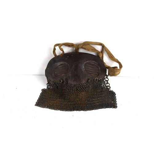 235 - A rare WWI tank crew splatter mask, steel base with leather padding, chain mail skirt and cloth stra... 