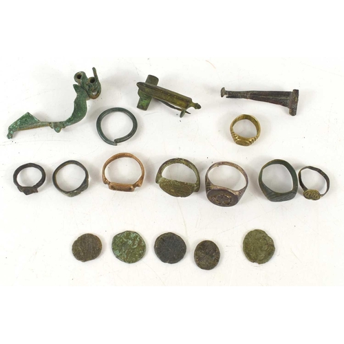 239 - Antiquities: A small group of Roman coins together with Roman brooches, Medieval bronze rings with s... 