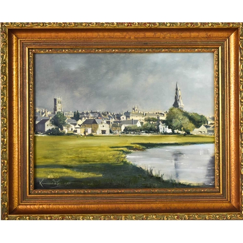 24 - Konrad E (British 20th Century): view of Stamford across the meadows, signed and dated 1982 bottom l... 