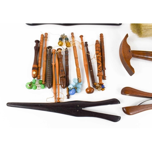 292 - A selection of 19th century treen, to include a fruitwood hat gauge, three pairs of glove stretchers... 