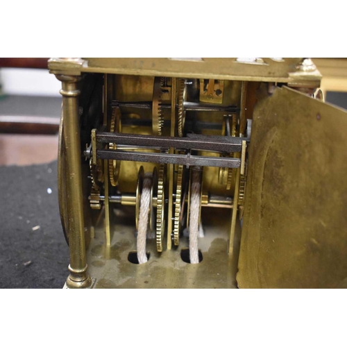 320 - A 19th century Scott of London brass lantern clock, the Roman numeral chapter ring bordering a centr... 