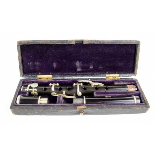 396 - A Rudall Carte & Co. Ltd., picollo flute number 2471, with name stamped to top and bottom, with addr... 