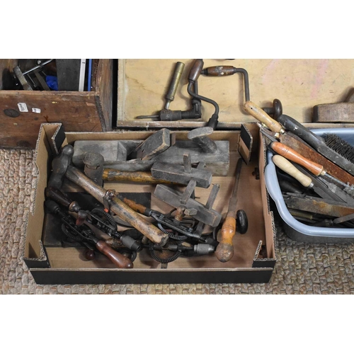 408 - A wooden carpenters tool box together with a quantity of tools to include set squares, wood plane, s... 