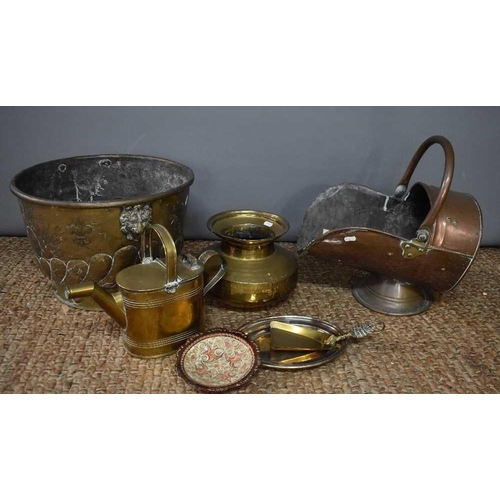 419 - A large brass planter decorated with a coat of arms together with a copper coal bucket, brass wateri... 