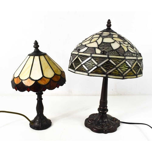 435 - Two Tiffany style table lamps, the larger with dome shade and leaded textured glass, with amber roun... 