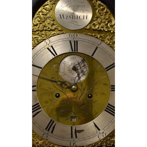 446 - An 18th century longcase clock by Christopher Biggin of Wisbich, the brass clock face having pieced ... 