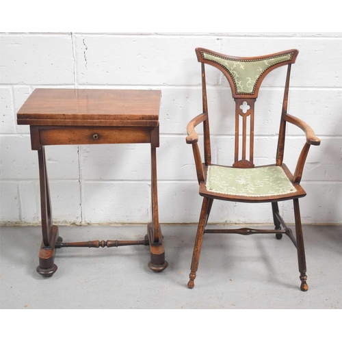 482 - A Victorian mahogany games table with swivel top and inlaid chess board together with an aesthetic m... 