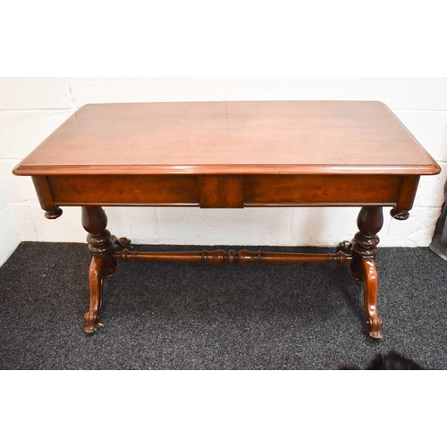 488 - A William IV mahogany library table, with two frieze drawers, pendant finials, the turned columns un... 