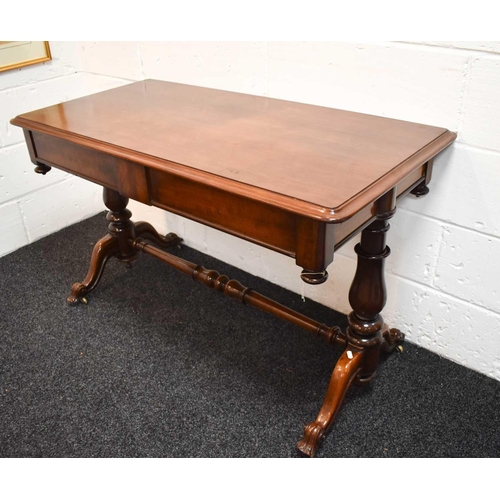 488 - A William IV mahogany library table, with two frieze drawers, pendant finials, the turned columns un... 