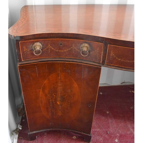 490 - A Georgian mahogany & satinwood serpentine sideboard, the drawers inlaid with marquetry decoration, ... 