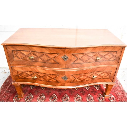 491 - A late 18th / early 19th century French satinwood commode, of serpentine form, with two long parquet... 