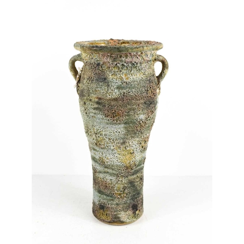 72 - A Ray Gardner studio pottery vase with twin handles and rough textured glaze, 28cm high.