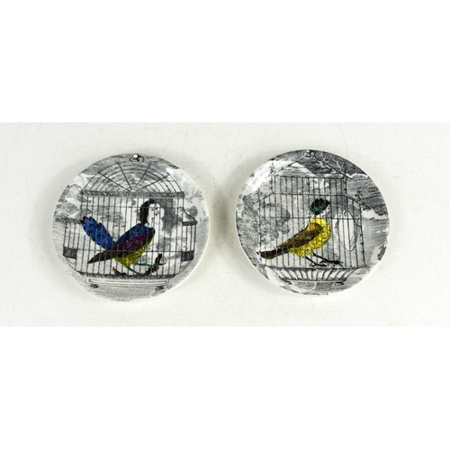 79 - A pair of Fornasetti dishes, 'Le Arpie' Gentili, 11cm diameter.