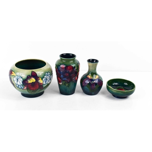 81 - A group of Moorcroft pottery to include two small bud vases, and two bowls, all stamped Moorcroft, t... 