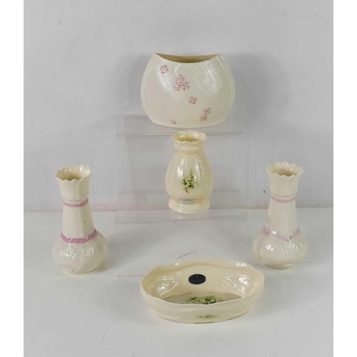 91 - A pair of Belleek Coral vases, a further Belleek vase of oval form with pink flowers and two Donegal... 