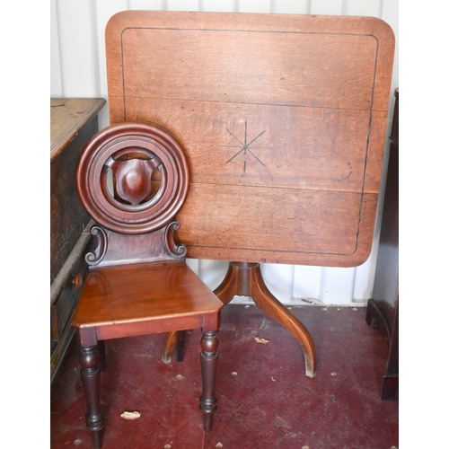 498 - A George II oak tripod table, the square tilt top having ebony stringing and inlay together with a V... 