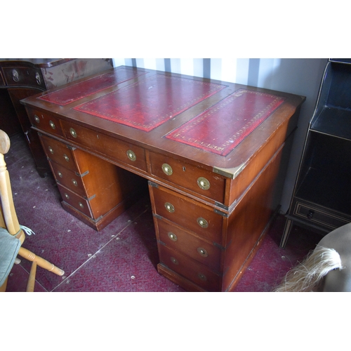 501 - A Victorian mahogany twin pedestal desk, with leather top, and two banks of drawers having ring pull... 