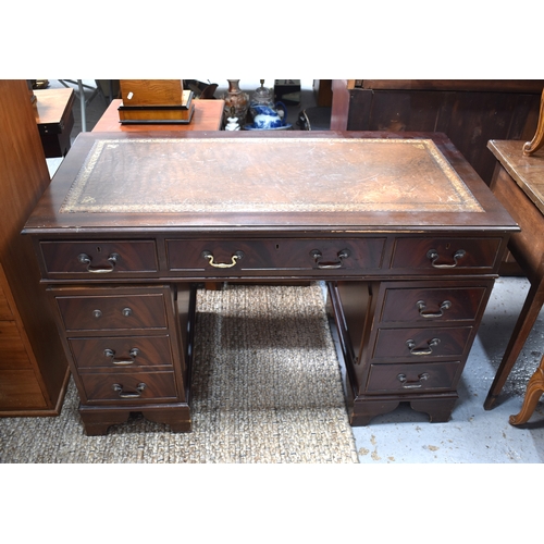 470 - A 20th century mahogany twin pedestal desk, with leather top, and two banks of drawers, 78 by 120 by... 