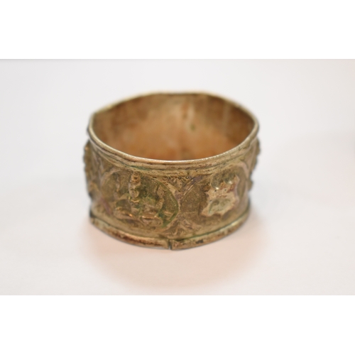 283 - A set of six Indonesian white metal napkin rings in original box marked for Rangoon together with on... 