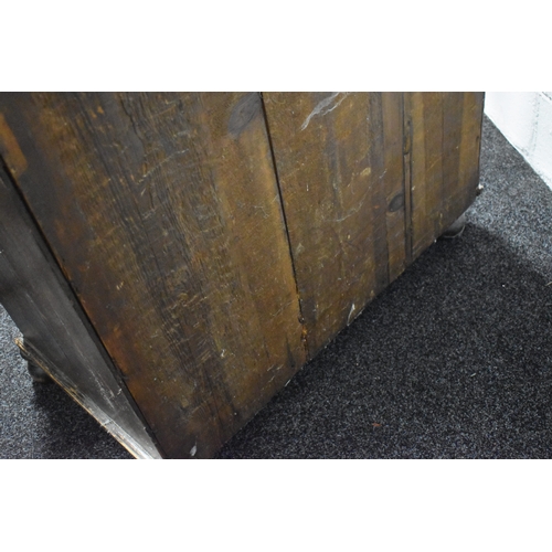 486 - An 18th century walnut chest of two over three drawers, with swan neck handles and brass lock plates... 