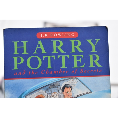 325 - A collection of J K Rowling books, comprising Harry Potter and The Prisoner of Azkaban, armorial pla... 