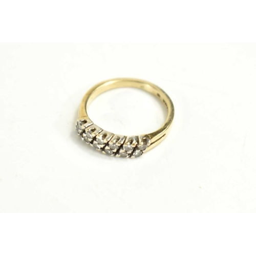 117 - A 9ct gold and diamond twelve stone ring, the diamond brilliants set in six diagonal pairs, size L, ... 