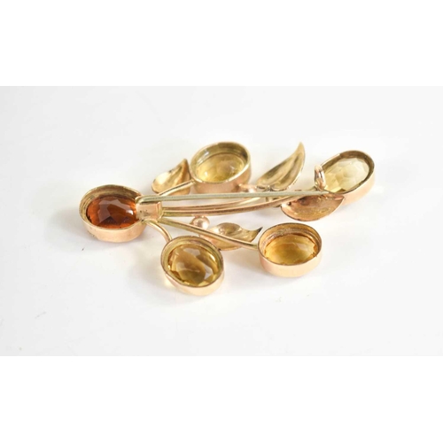 138 - A 14ct gold, citrine, seed pearl and orange sapphire brooch in the form of a floral spray, 5.5cm lon... 