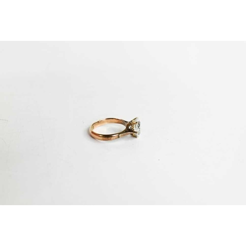 144 - A 14ct gold ring set with clear paste stone, size O, 3.47g.