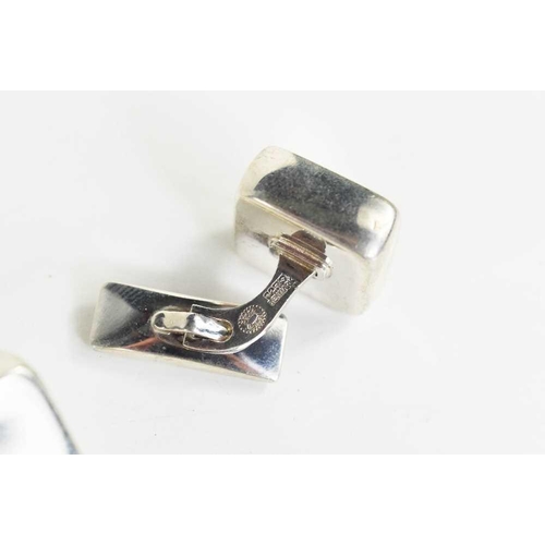 150 - A pair of Georg Jensen silver cufflinks, of square cushion form, stamped with makers mark, 925 Denma... 