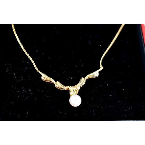 151 - A 14ct gold, pearl and diamond brilliant necklace, the wave pendant set with a single pearl and diam... 