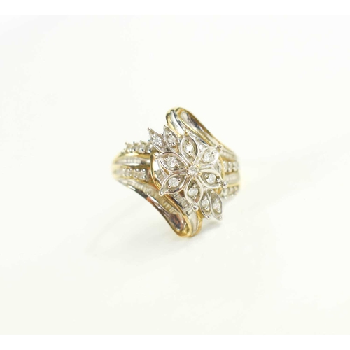 157 - A 9ct gold and diamond cluster ring, the centre of flowerhead form, 4.3g. size Q.