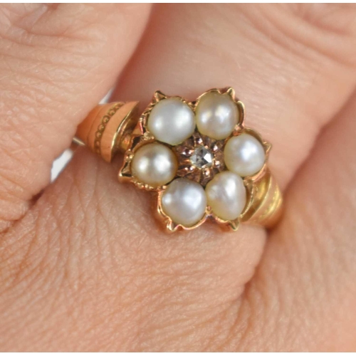 179 - An 18ct gold, old cut diamond and seed pearl flowerhead ring, the central old cut diamond surrounded... 