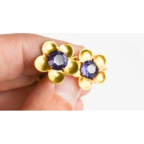 192 - A 22ct gold and deep purple sapphire ring, size N/O, 5.75g, together with an unmarked pair of earrin... 