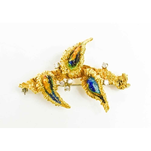 197 - An 18ct gold, diamond and enamel brooch, in a modernist foliate form, composed of three 'leaves' on ... 
