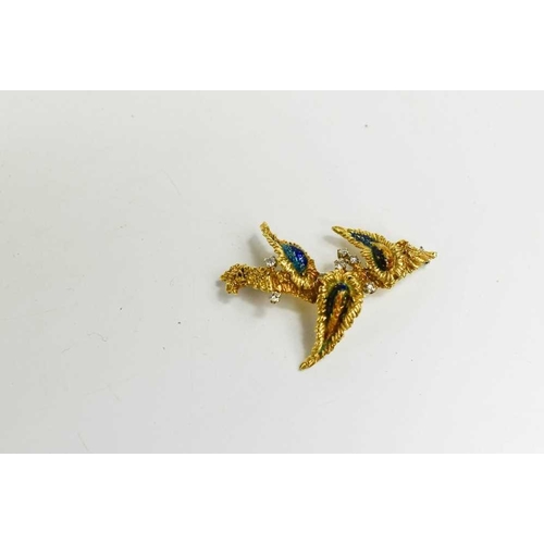197 - An 18ct gold, diamond and enamel brooch, in a modernist foliate form, composed of three 'leaves' on ... 