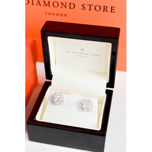 203 - A pair of 18ct white gold and diamond 'Halo' earrings, of square cluster form, the brilliant cut dia... 