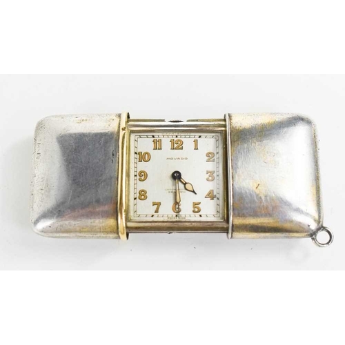 250 - A Movado silver travelling pendant watch, Chronometer Ermeto, the silver-plated case opens to reveal... 