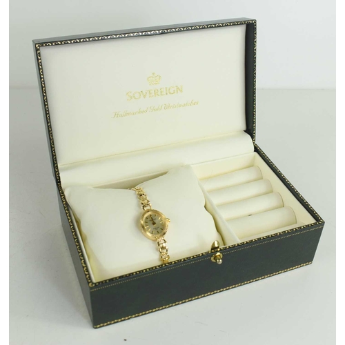 256 - A 9ct gold Sovereign cocktail watch the signed champagne dial with baton numerals, on a 9ct gold bow... 