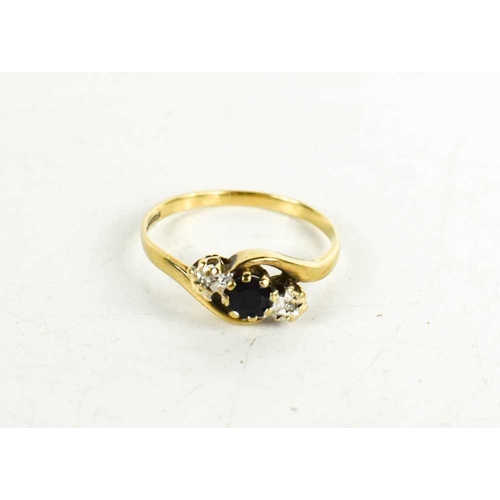 58 - A 9ct gold, sapphire and diamond crossover ring, the central diamond adjoined by an illusion set dia... 