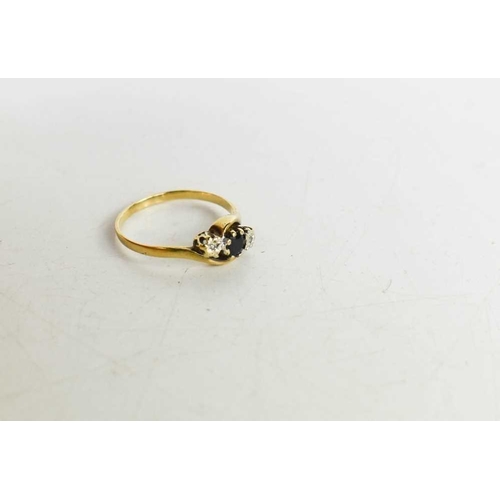 58 - A 9ct gold, sapphire and diamond crossover ring, the central diamond adjoined by an illusion set dia... 