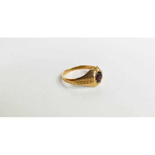 75 - A 9ct gold and garnet ring, the solitaire stone inset, with floral band to the shoulders, size T, 2.... 