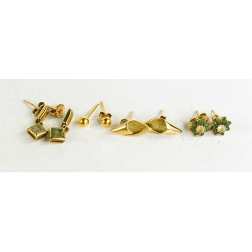 98 - Four pairs of 9ct gold stud earrings, including a pair of flowerhead examples set with emeralds and ... 