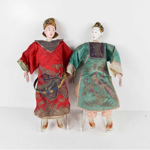 101 - Two Japanese late 19th century Emperor & Empress dolls, the Emperor with crowned headdress, both wea... 