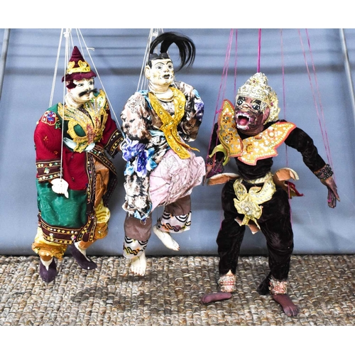 106 - Three early 20th century Burmese puppets, made to represent characters in the Ramayana; a famous pla... 