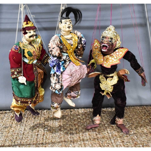 106 - Three early 20th century Burmese puppets, made to represent characters in the Ramayana; a famous pla... 