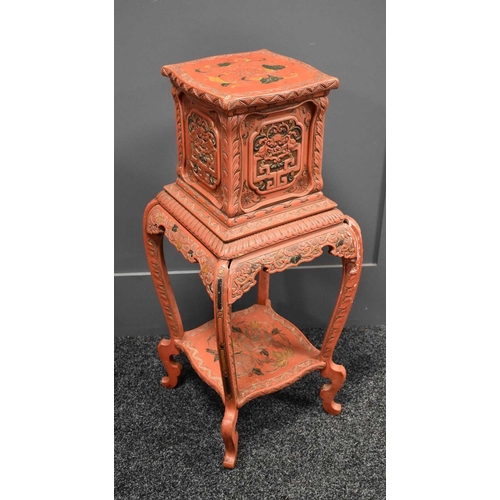 110 - A vintage Chinese red lacquered jardiniere stand, carved with stylised floral decoration throughout,... 