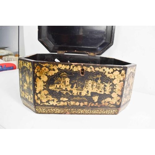 113 - A 19th century Chinese black lacquered box, decorated with gilded penwork to depict vistas and borde... 