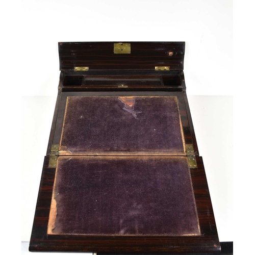 120 - A 19th century workbox, in simulated rosewood, with a sloped lid, the top cover opens to reveal the ... 