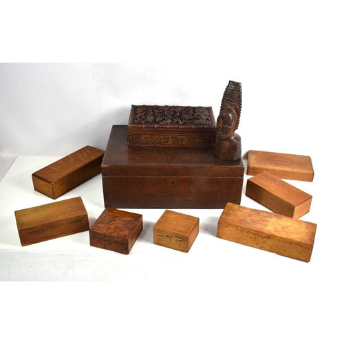 129 - A collection of treen to include a Indian carved walnut jewellery box, Birds Eye Maple cigarette box... 